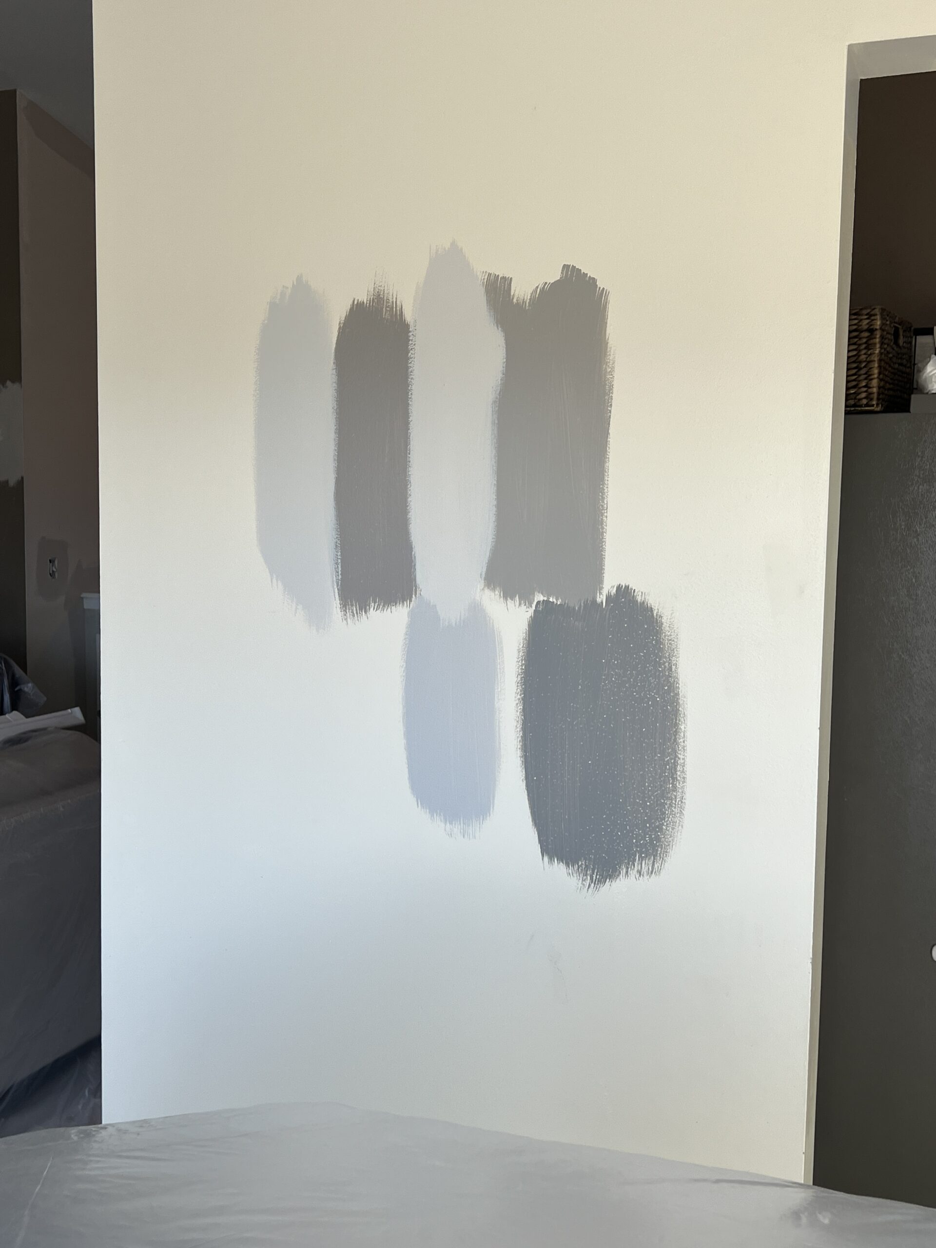 Testing out paint colors on their walls.