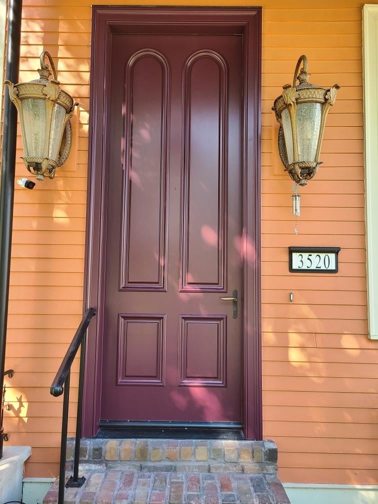 Front door painted a beautiful purple color in New Town, MO a wonderful community in St. Charles County, Missouri.