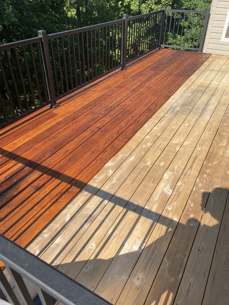 A deck that we started staining. The clients were grateful when we completed the deck. 